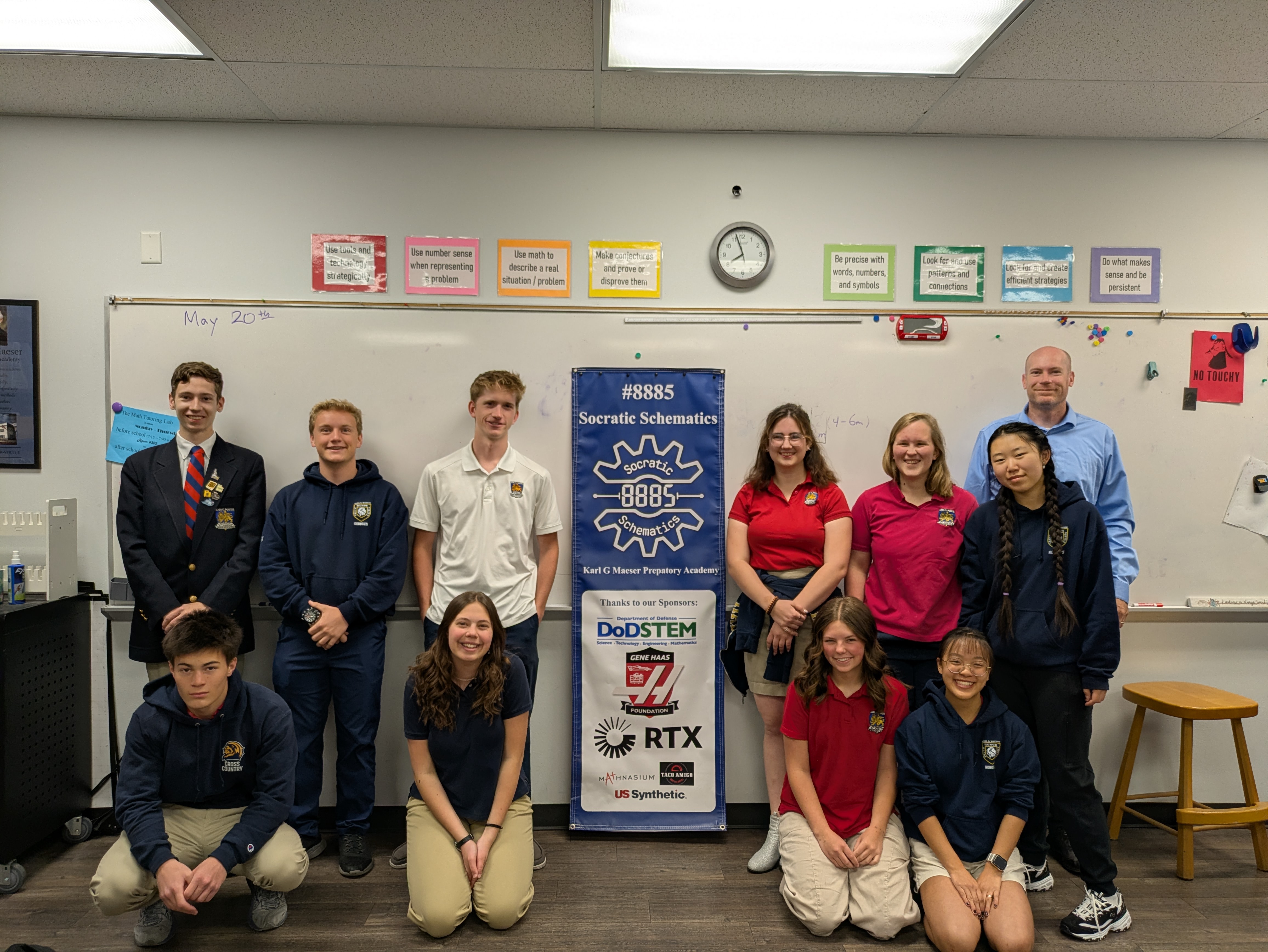Team with sponsors banner